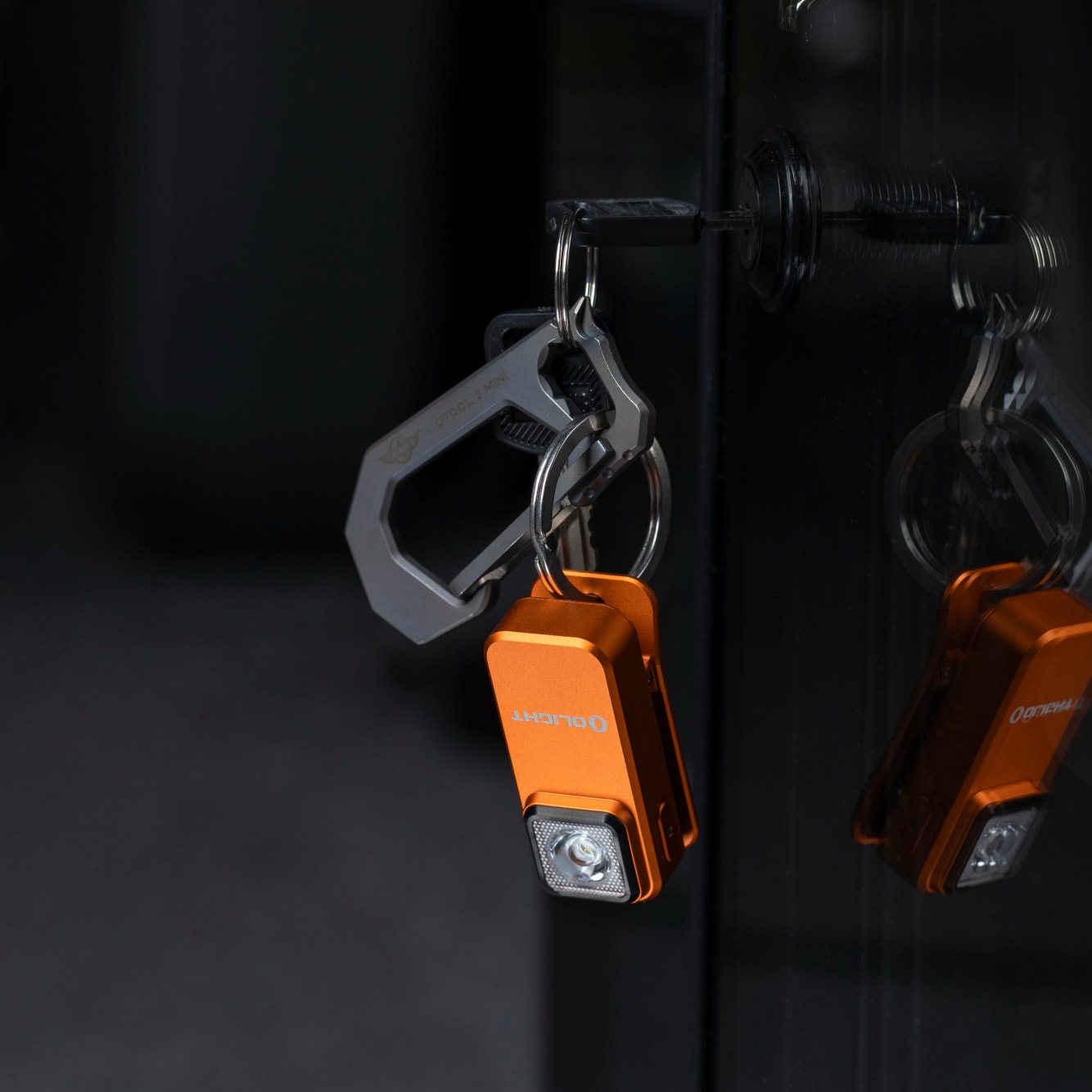 Latarka akumulatorowa Olight Oclip Orange - 300 lumenów